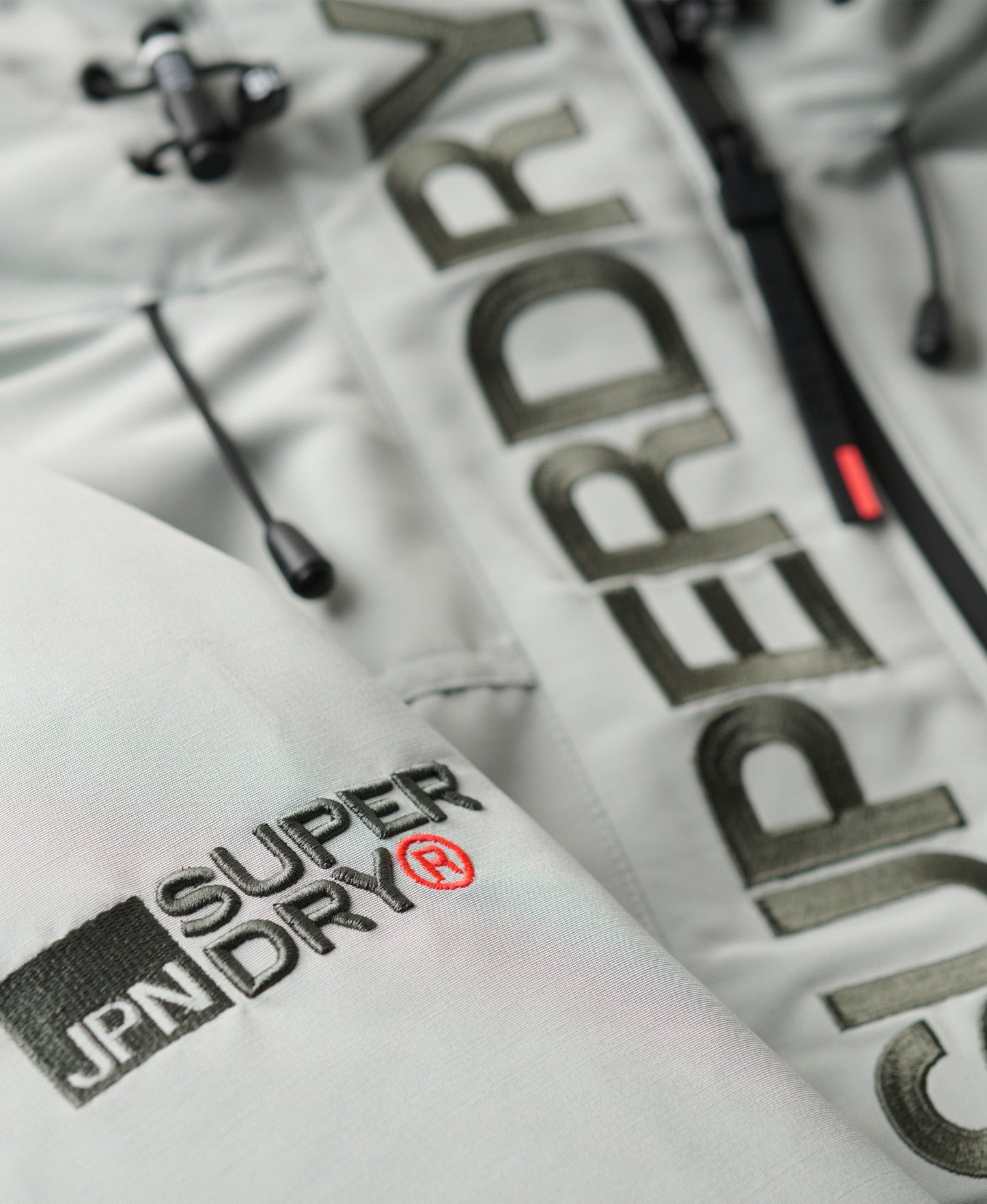 Hooded Ultimate Embroidered Windbreaker | Puritan Grey
